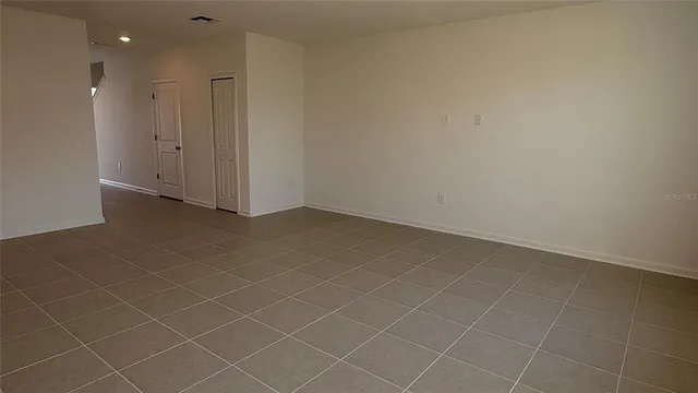 an empty room with a bathroom