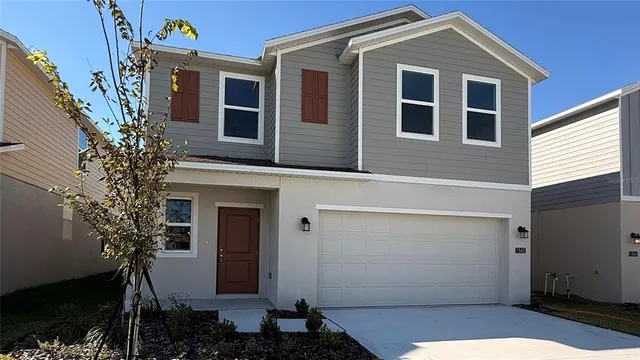 a front view of house with yard