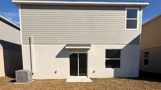 a view of a terrace with a large window