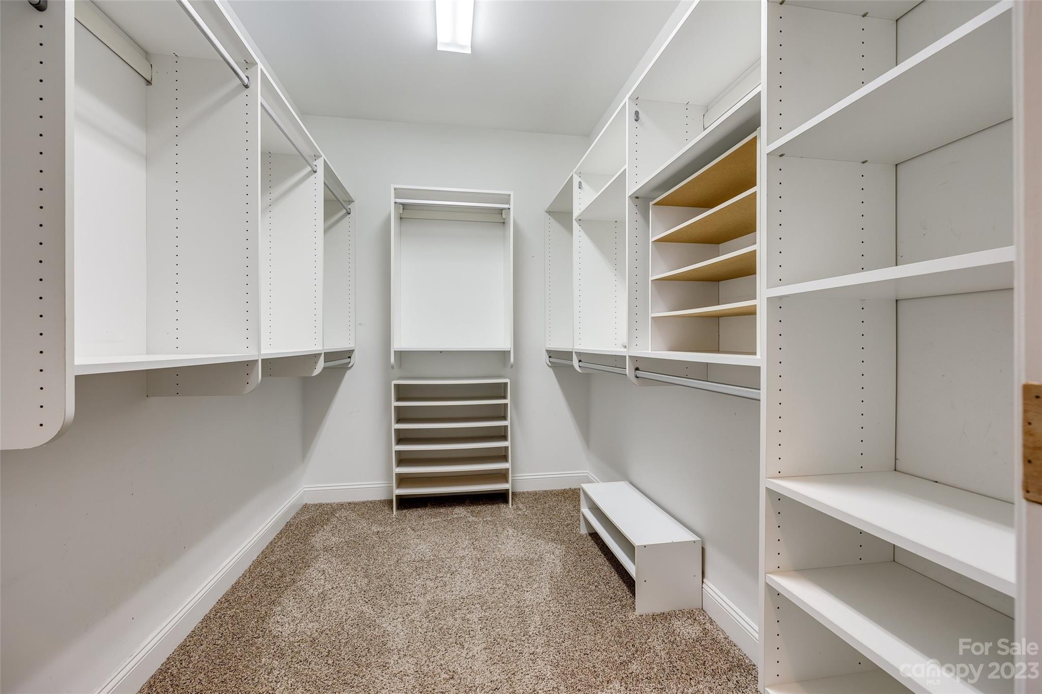 4142 Sunset Ridge Drive, Unit 117 Rock Hill, SC 29732 - Photo 20 of 48 a view of walk in closet with empty racks