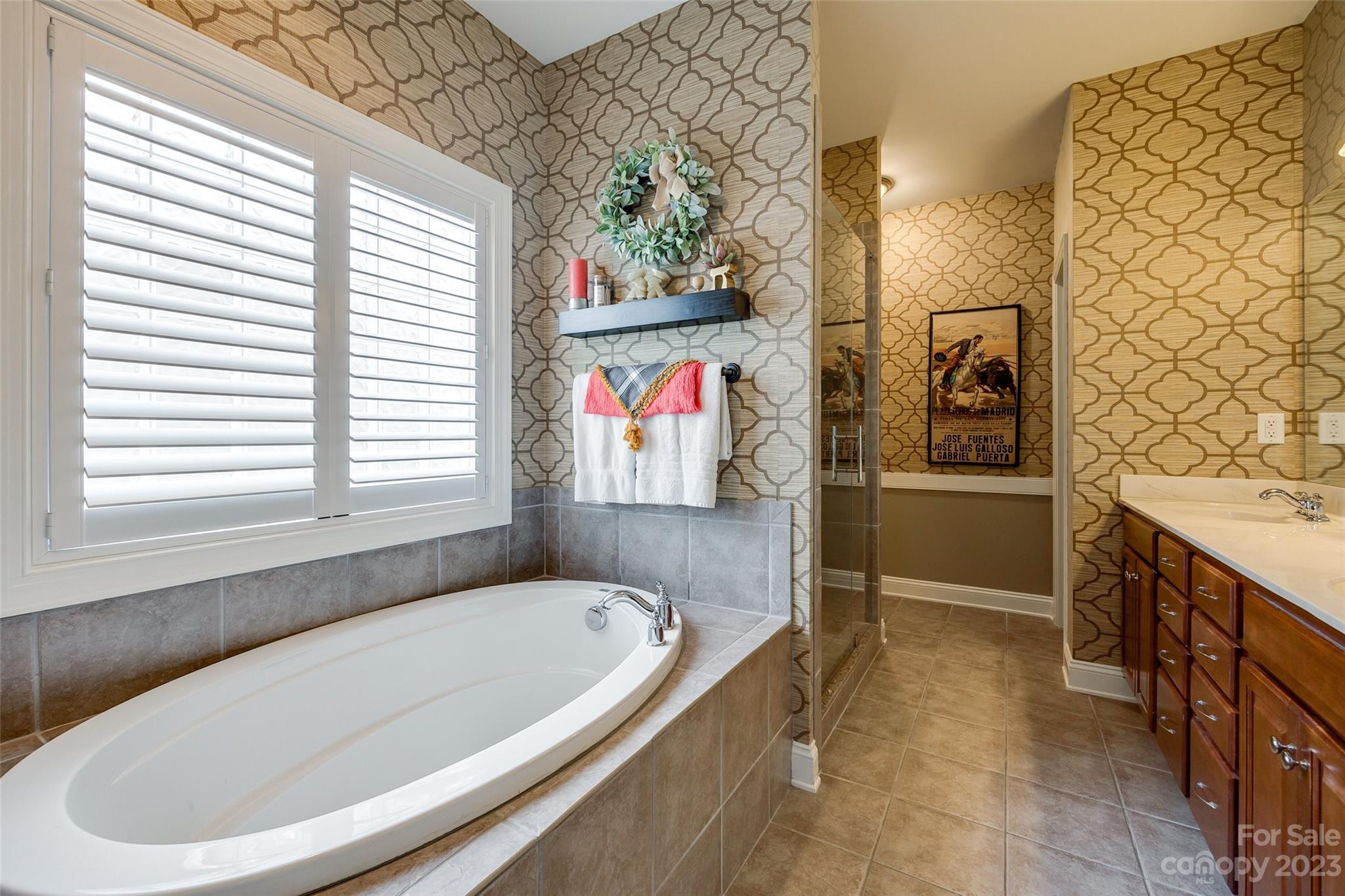 4142 Sunset Ridge Drive, Unit 117 Rock Hill, SC 29732 - Photo 21 of 48 a bathroom with a bathtub and a shower