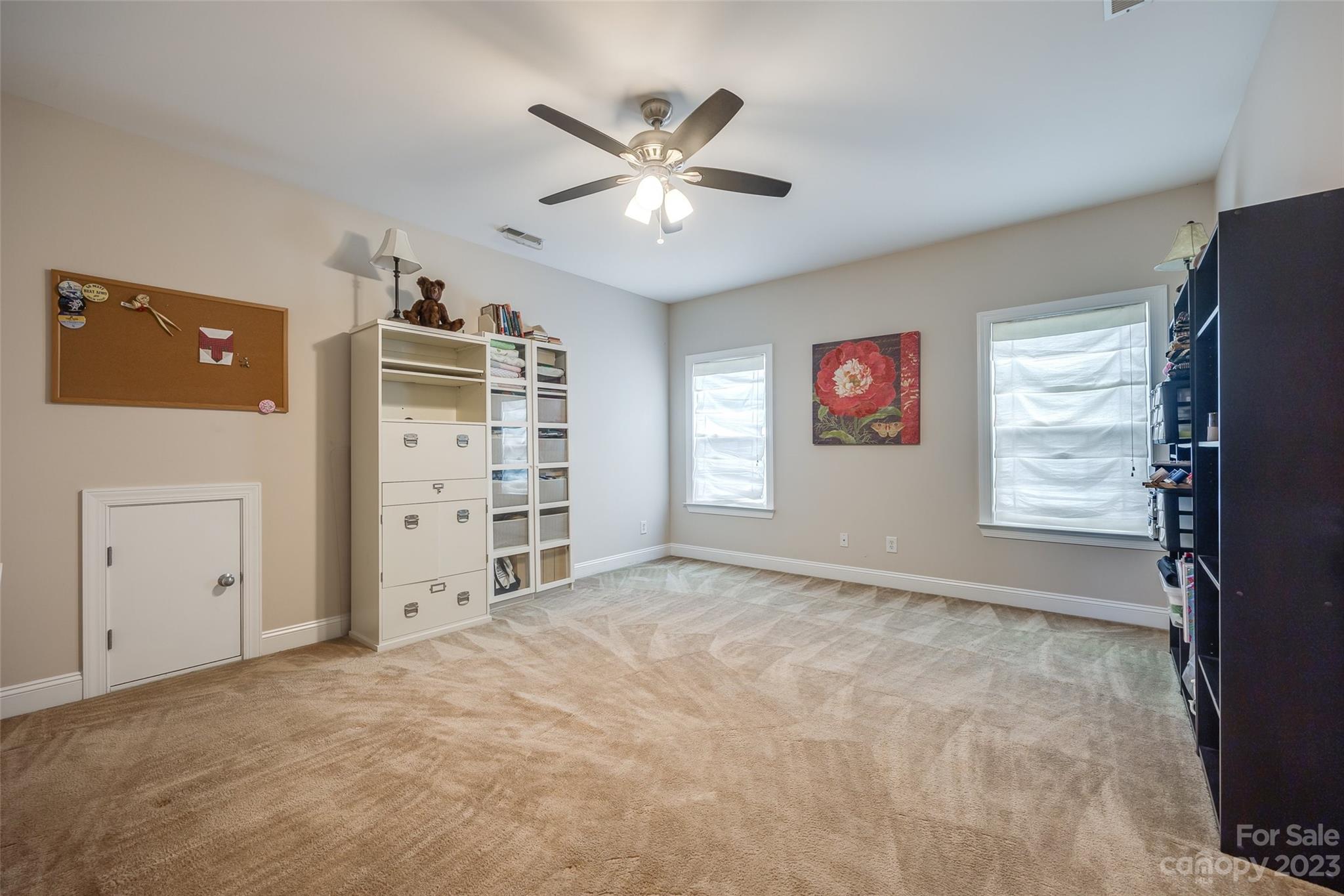 4142 Sunset Ridge Drive, Unit 117 Rock Hill, SC 29732 - Photo 30 of 48 a view of an empty room with cabinet and a window
