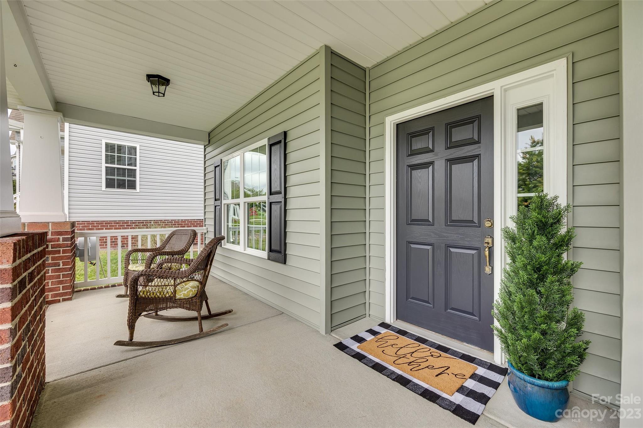 4142 Sunset Ridge Drive, Unit 117 Rock Hill, SC 29732 - Photo 3 of 48 a balcony with furniture and potted plants
