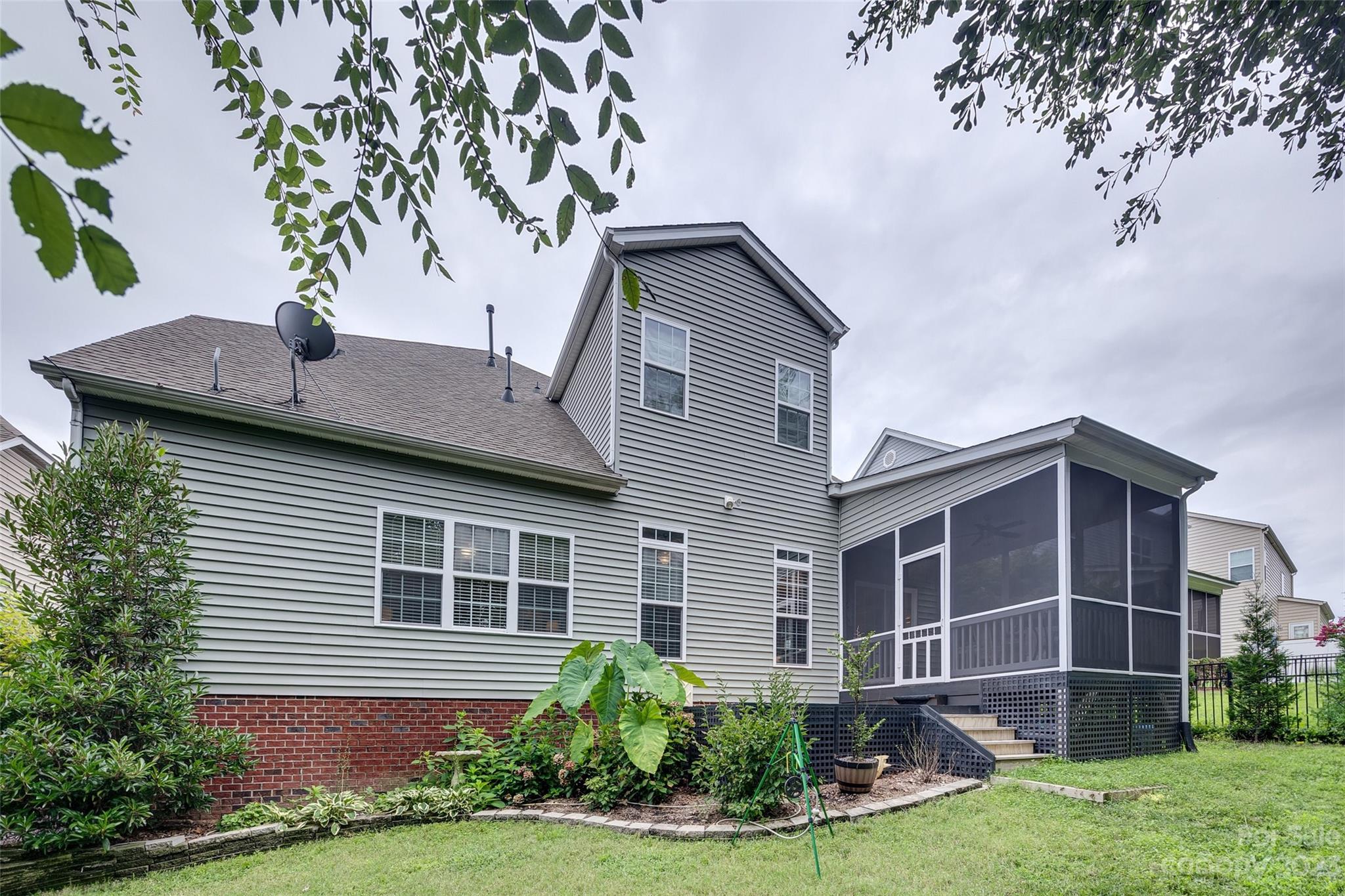 4142 Sunset Ridge Drive, Unit 117 Rock Hill, SC 29732 - Photo 35 of 48 a house that has a tree in front of the house