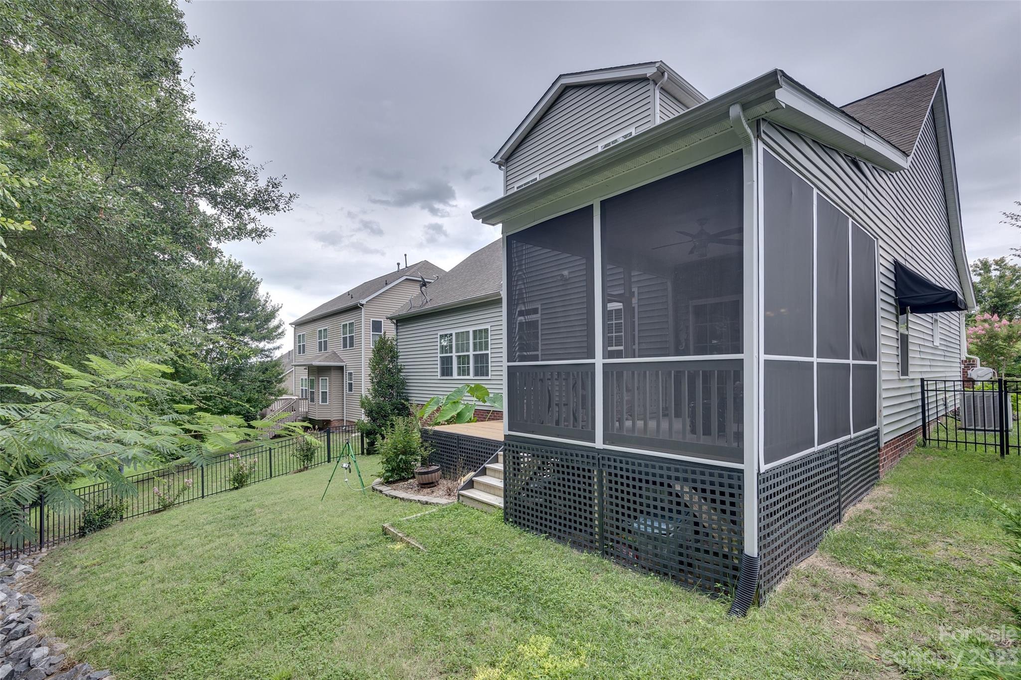 4142 Sunset Ridge Drive, Unit 117 Rock Hill, SC 29732 - Photo 36 of 48 a view of backyard with deck and trees