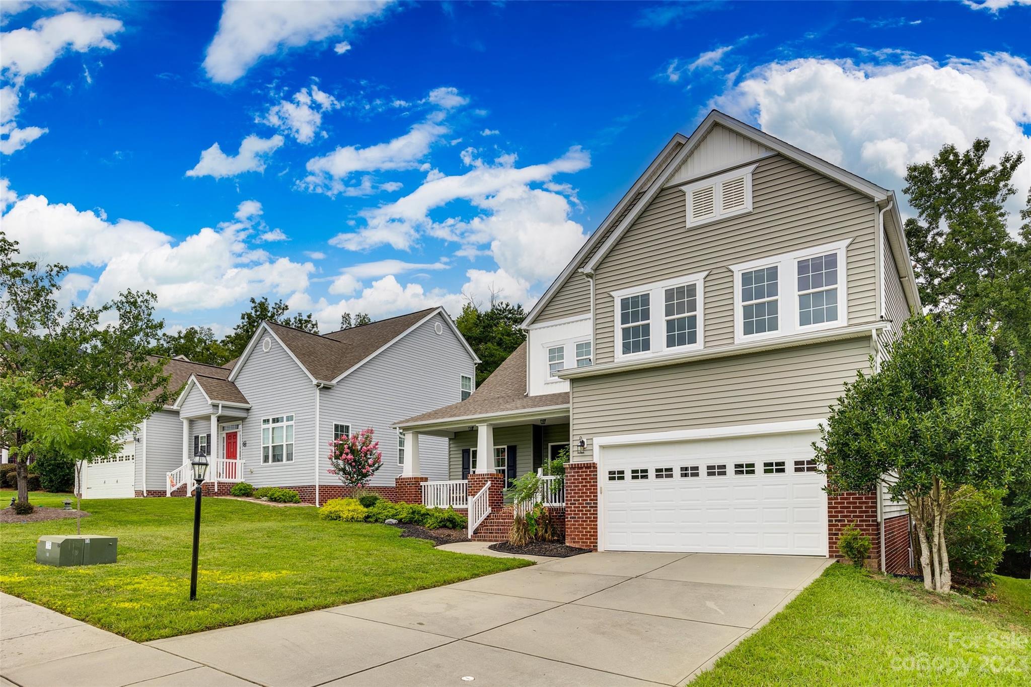 4142 Sunset Ridge Drive, Unit 117 Rock Hill, SC 29732 - Photo 37 of 48 a front view of a house with a garden