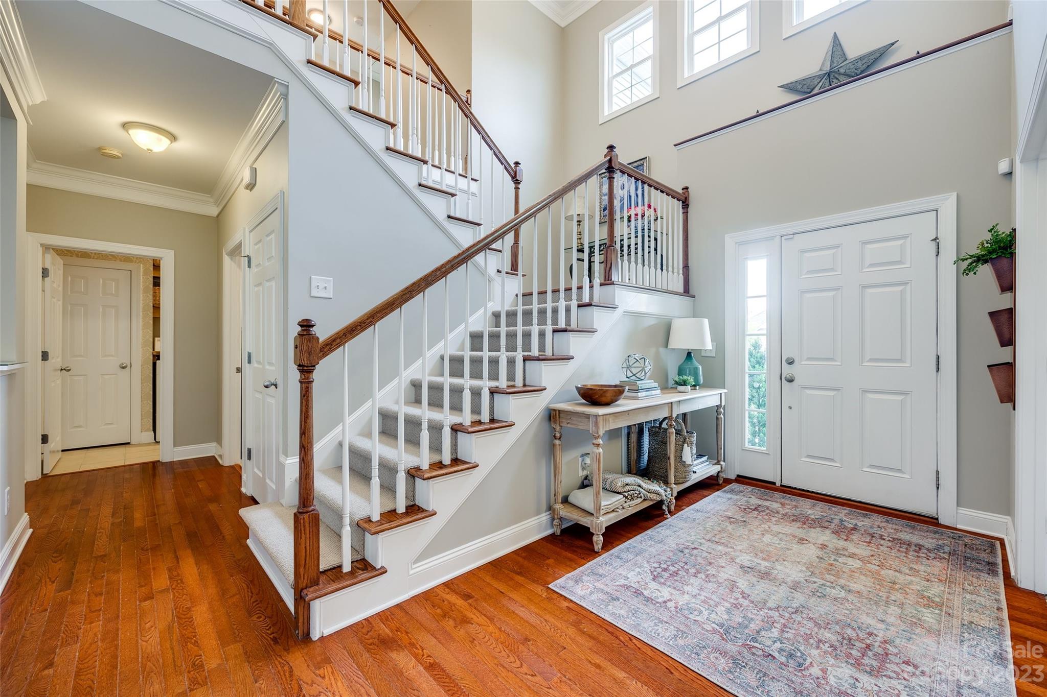 4142 Sunset Ridge Drive, Unit 117 Rock Hill, SC 29732 - Photo 6 of 48 a view of entryway dining room and hall with wooden floor