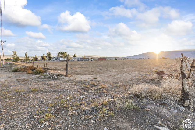1299 North Brooklyn Road Monroe, UT 84754 - Photo 12 of 18 Expansive land parcel featuring a post-and-wire fence and distant mountain range