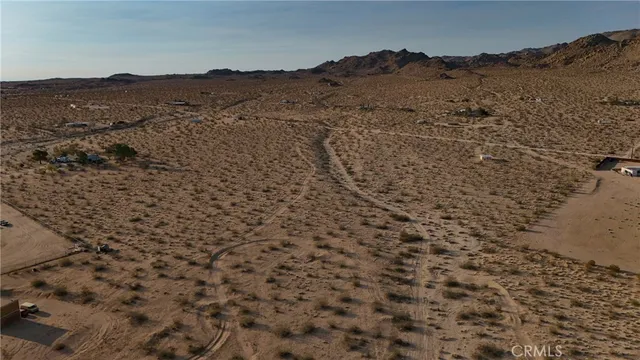 a view of mountains and valleys