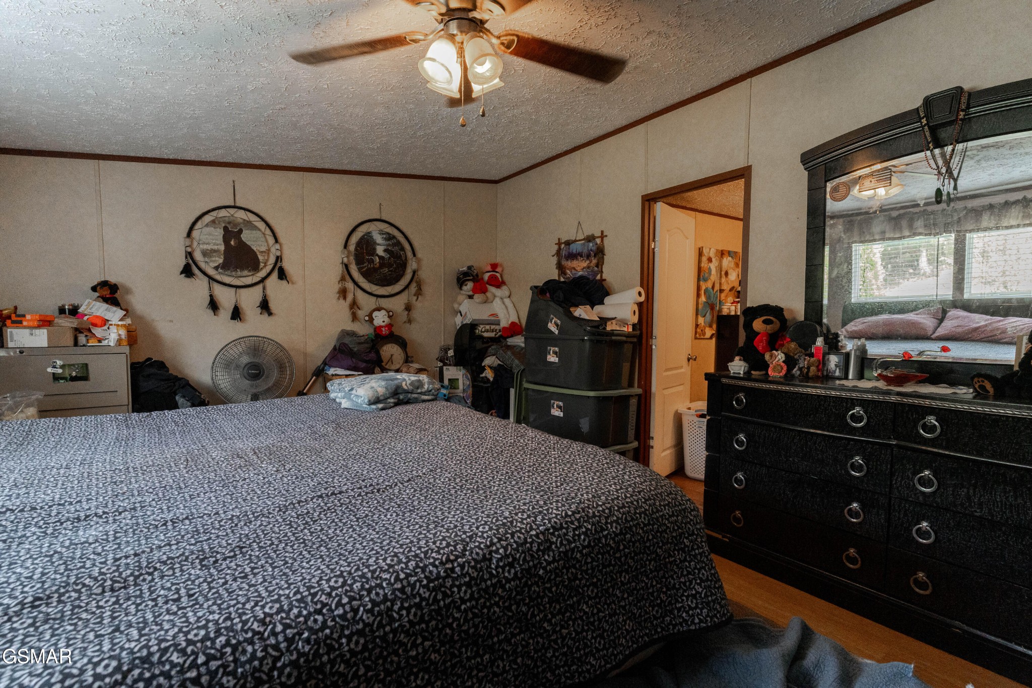 275 Crowder Road Madisonville, TN 37354 - Photo 6 of 21 a bedroom with a bed and a chandelier