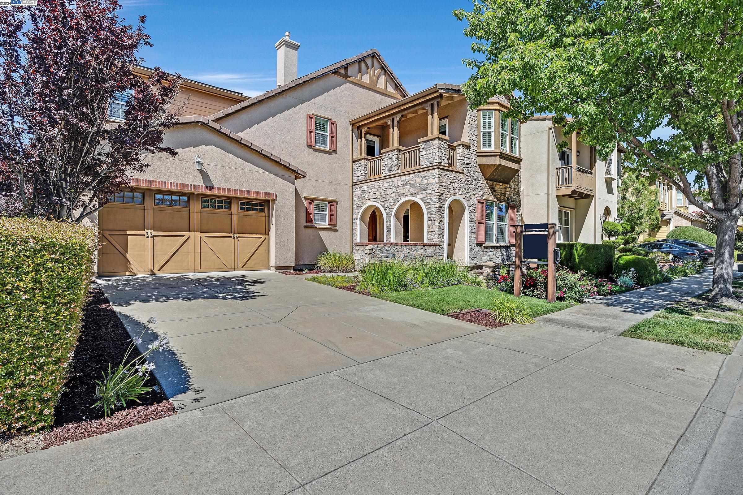 5103 Holborn Way San Ramon, CA 94582 - Photo 1 of 1 a front view of a house with a yard and garage