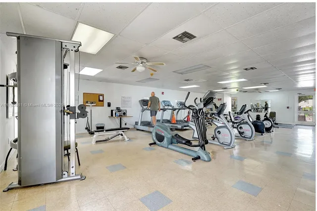 a room with lots of chairs and a table