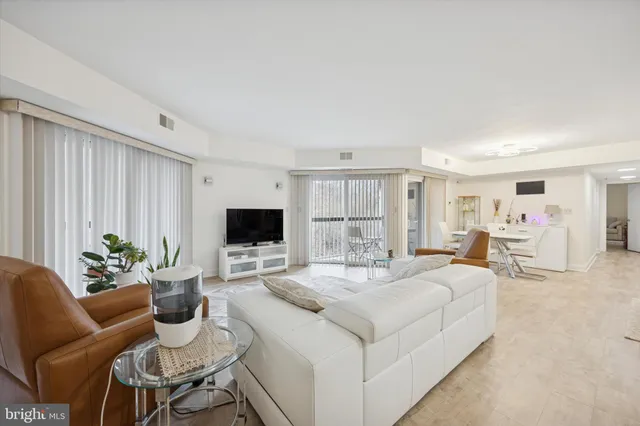 a workspace with furniture and a window