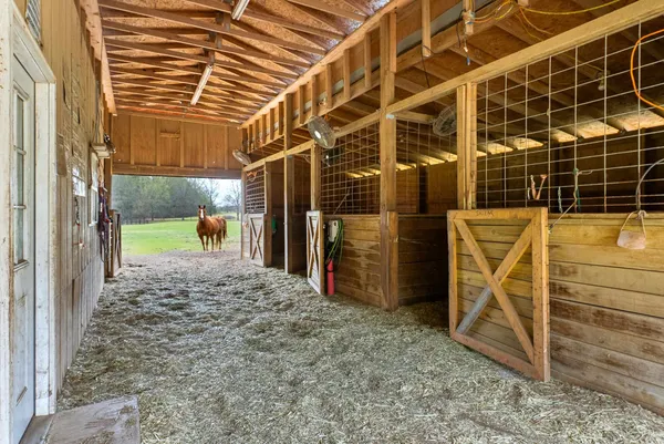 a view of a room with wooden walls