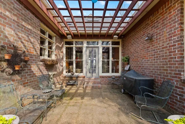 a view of a porch with chairs