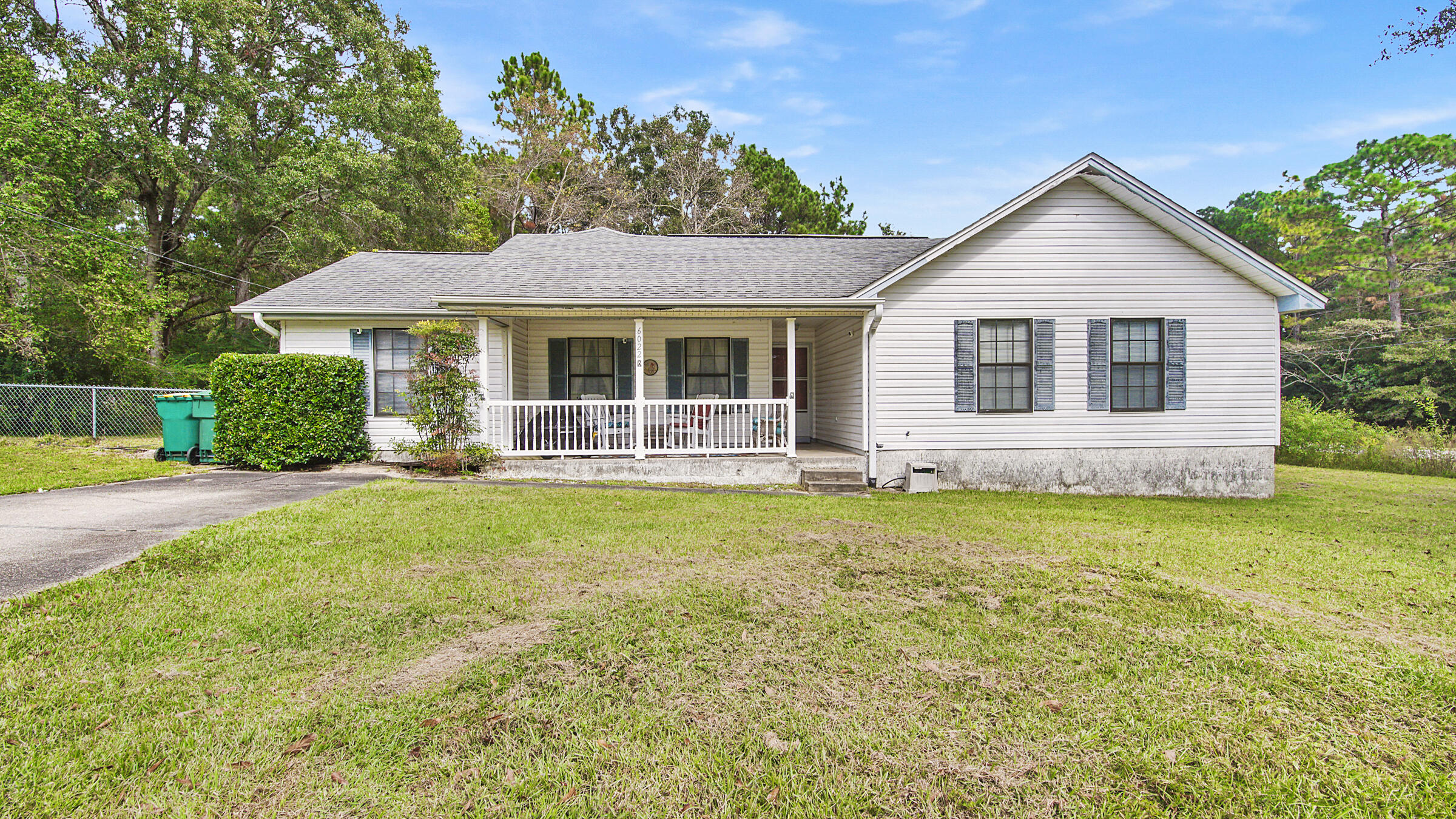 6022 Old Bethel Road Crestview, FL 32536 - Photo 1 of 19 a front view of house with yard and green space