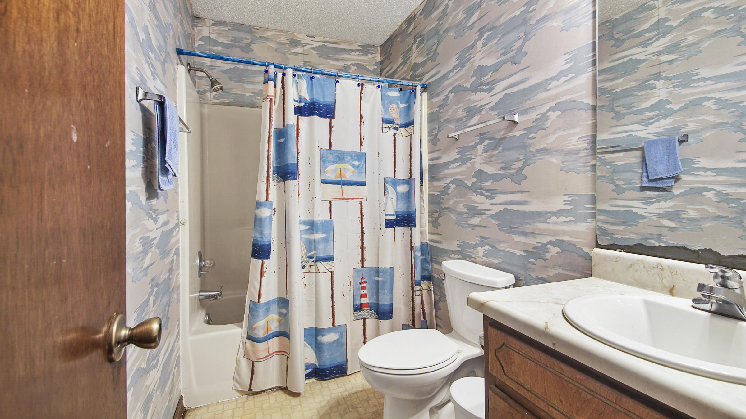 6022 Old Bethel Road Crestview, FL 32536 - Photo 12 of 19 a bathroom with a sink toilet and shower