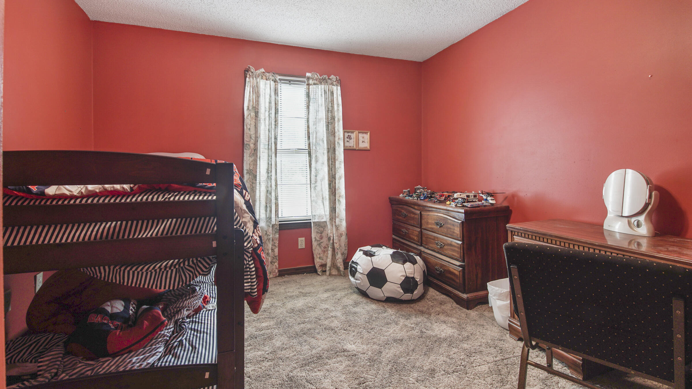 6022 Old Bethel Road Crestview, FL 32536 - Photo 13 of 19 a bedroom with a bed and a window