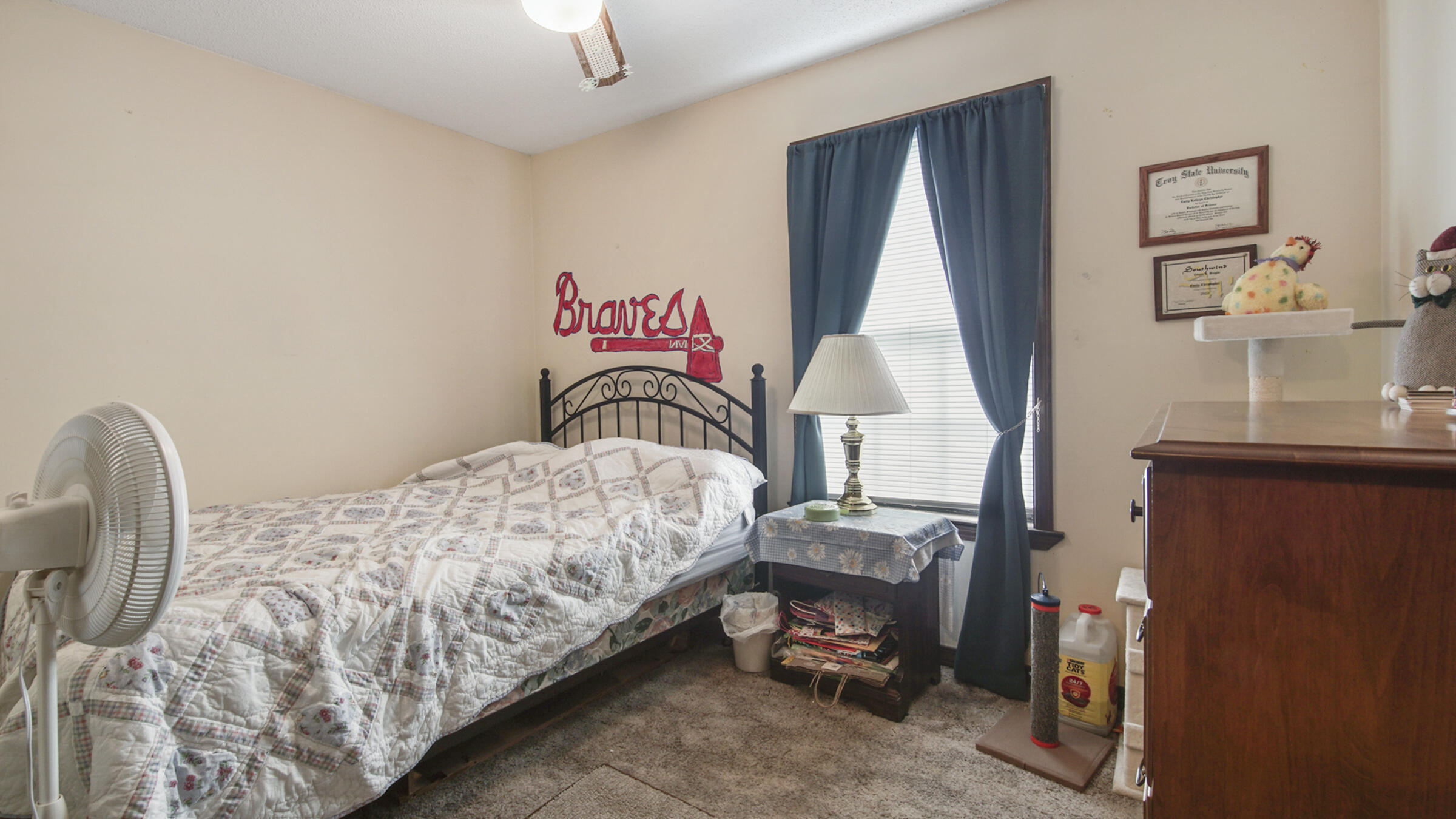 6022 Old Bethel Road Crestview, FL 32536 - Photo 16 of 19 a bedroom with bed and a window