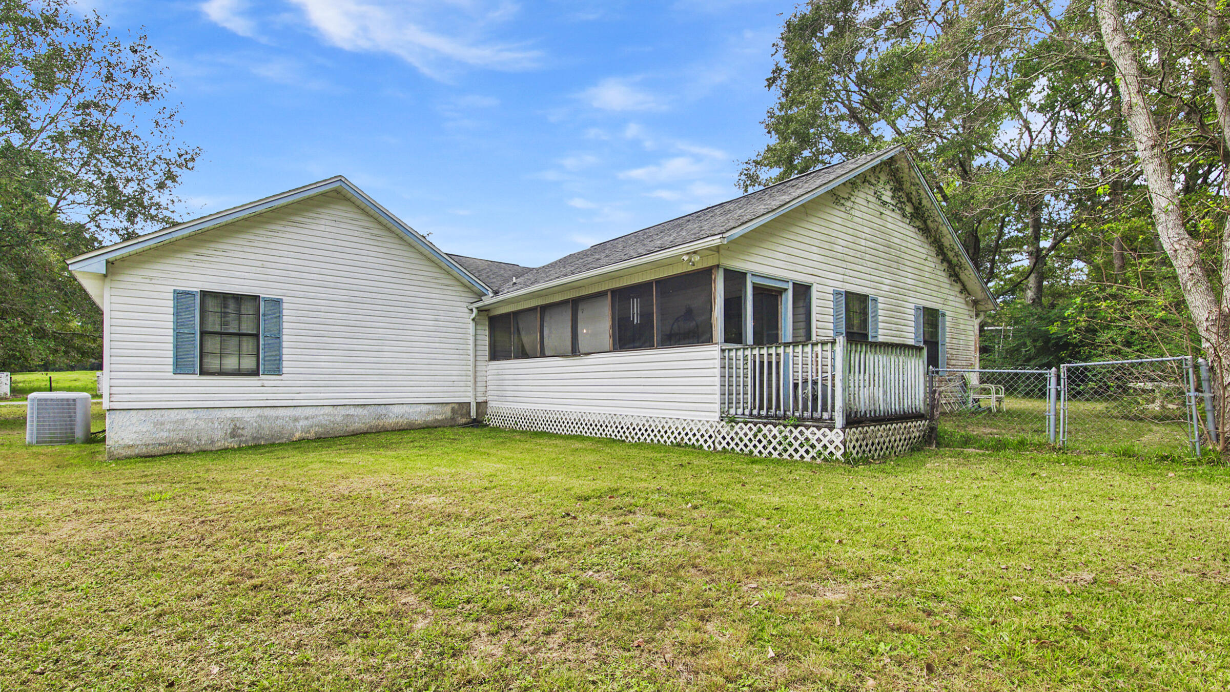 6022 Old Bethel Road Crestview, FL 32536 - Photo 18 of 19 a view of a house with a yard