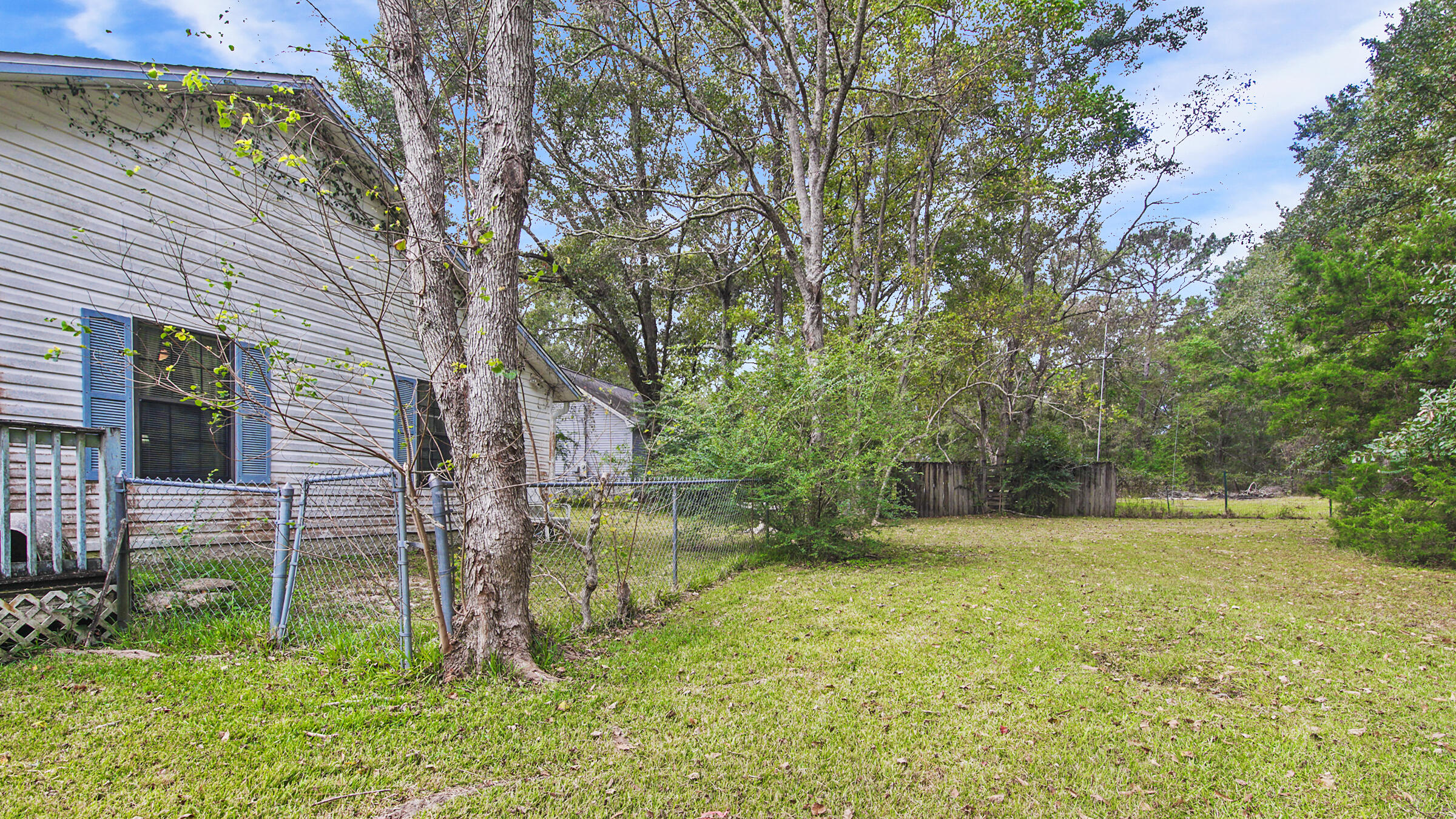 6022 Old Bethel Road Crestview, FL 32536 - Photo 19 of 19 a backyard of a house with lots of green space