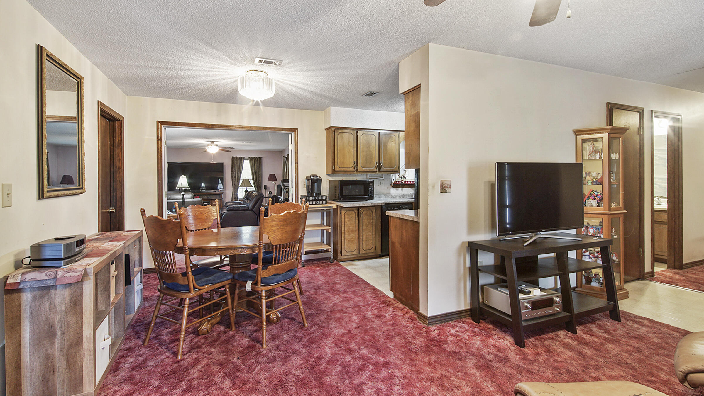 6022 Old Bethel Road Crestview, FL 32536 - Photo 5 of 19 a view of a dining room with furniture and wooden floor