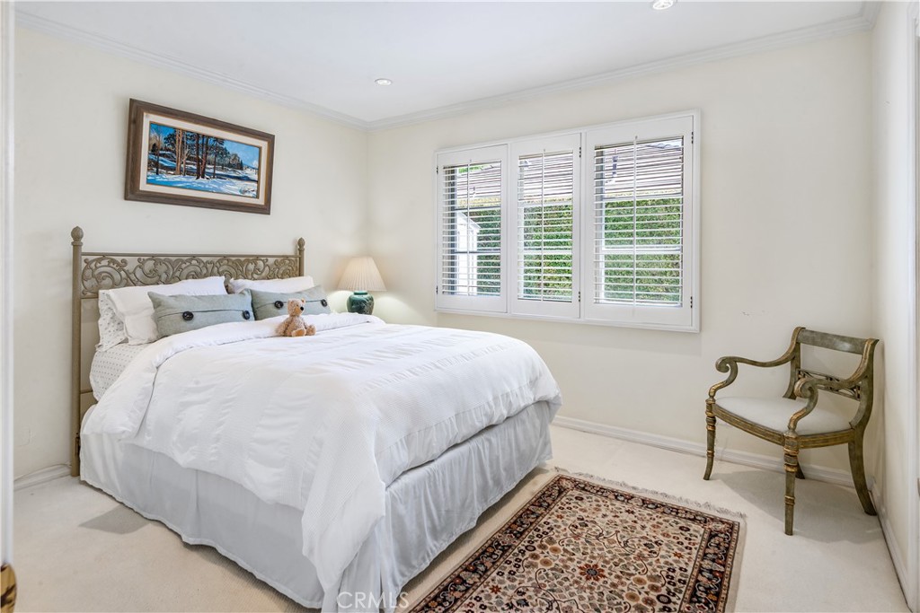 29 Santa Barbara Drive Rancho Palos Verdes, CA 90275 - Photo 14 of 17 a bedroom with a bed and chair