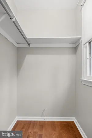 a view of small space with racks on the wall