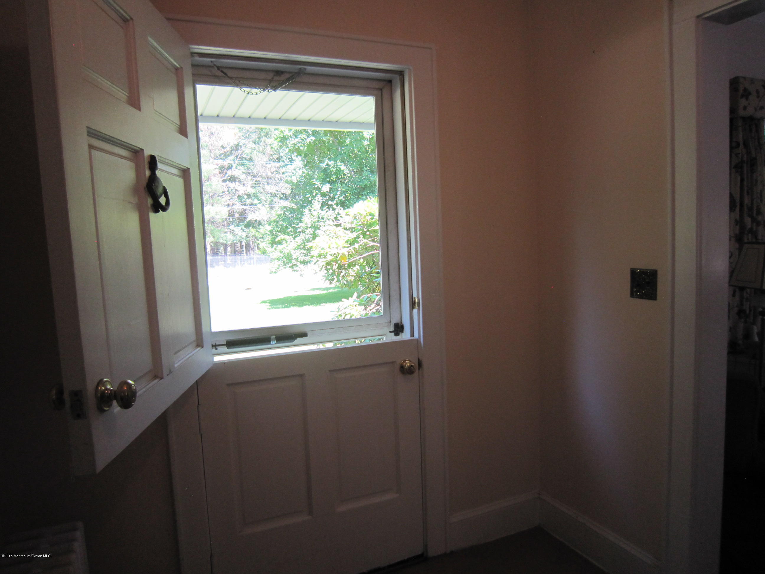 482 Brickyard Road Freehold, NJ 07728 - Photo 13 of 17 a view of a window in an empty room
