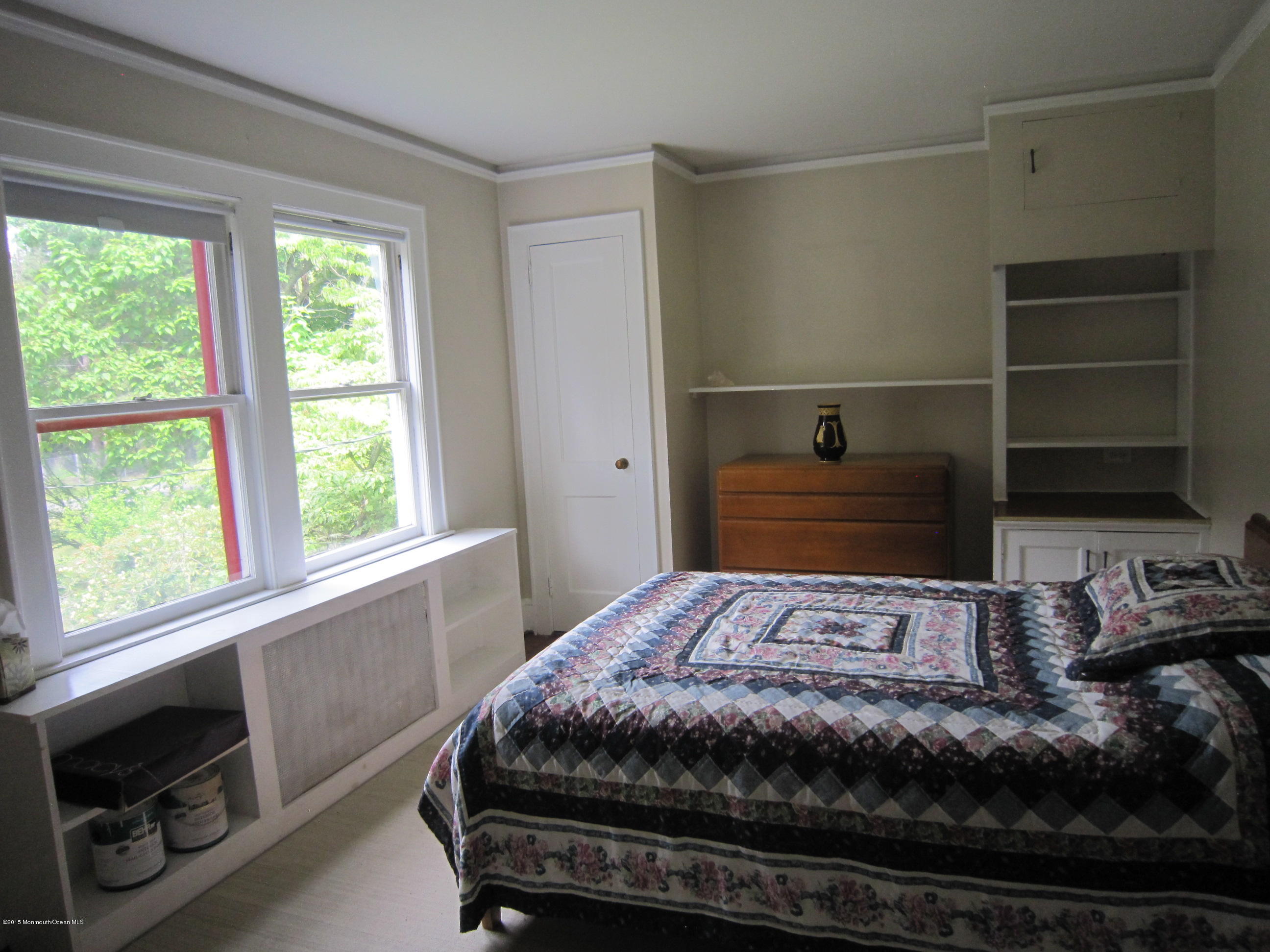 482 Brickyard Road Freehold, NJ 07728 - Photo 3 of 17 a bedroom with a bed and a window