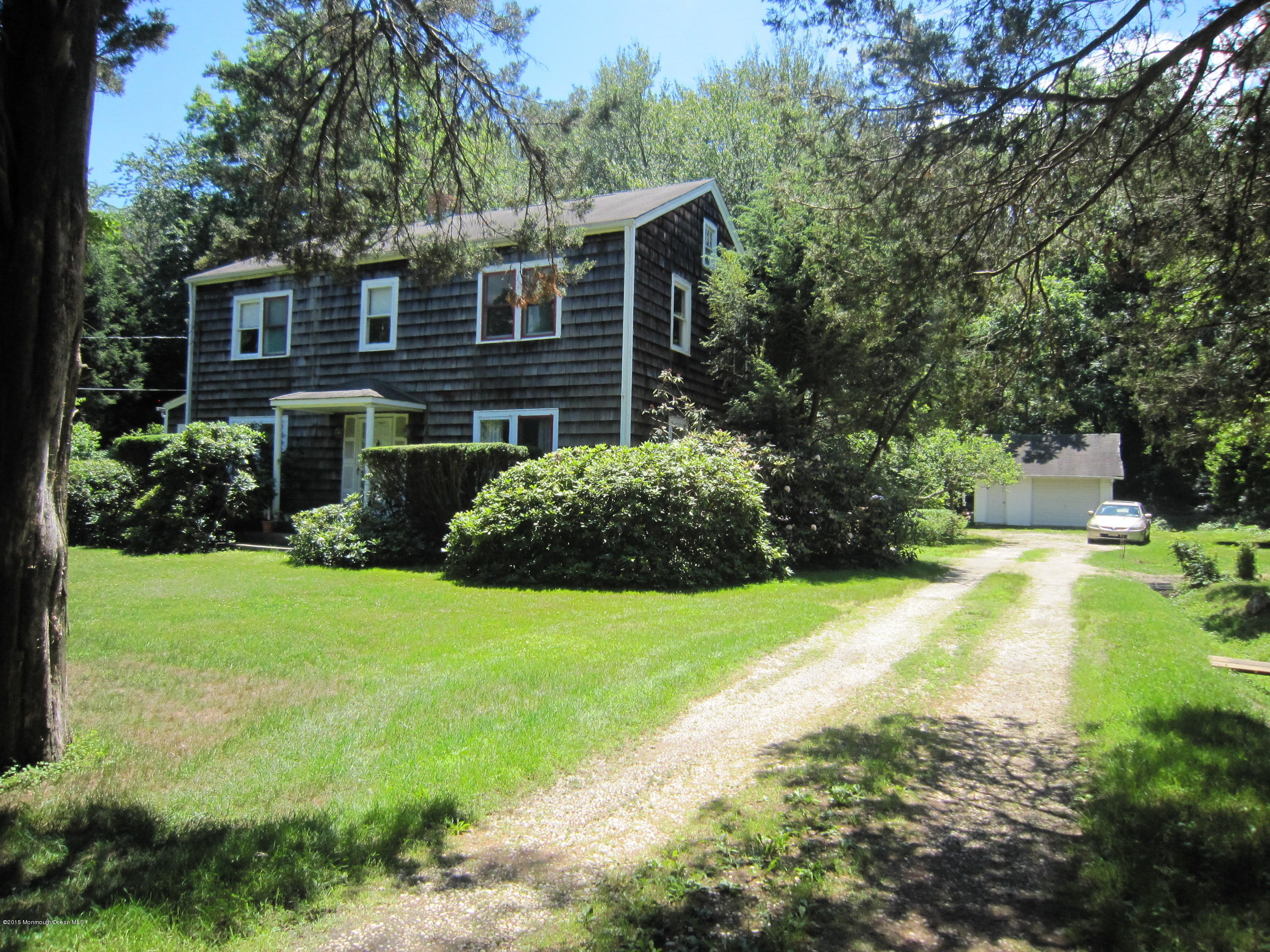 482 Brickyard Road Freehold, NJ 07728 - Photo 8 of 17 a view of a house with pool and garden