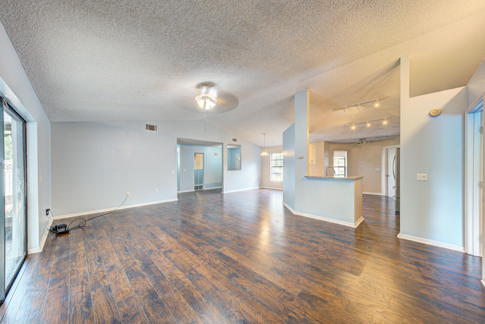 2423 Jaywood Road Titusville, FL 32780 - Photo 16 of 37 a view of empty room with wooden floor
