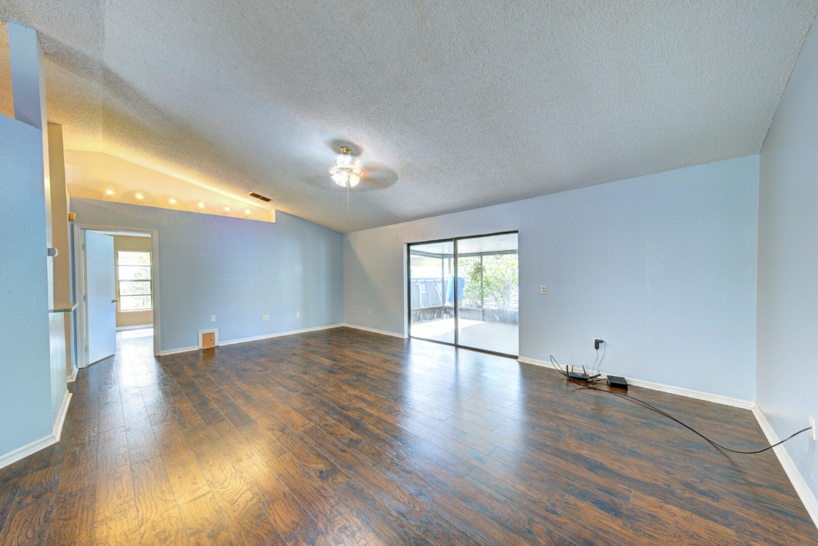 2423 Jaywood Road Titusville, FL 32780 - Photo 18 of 37 a view of empty room with wooden floor