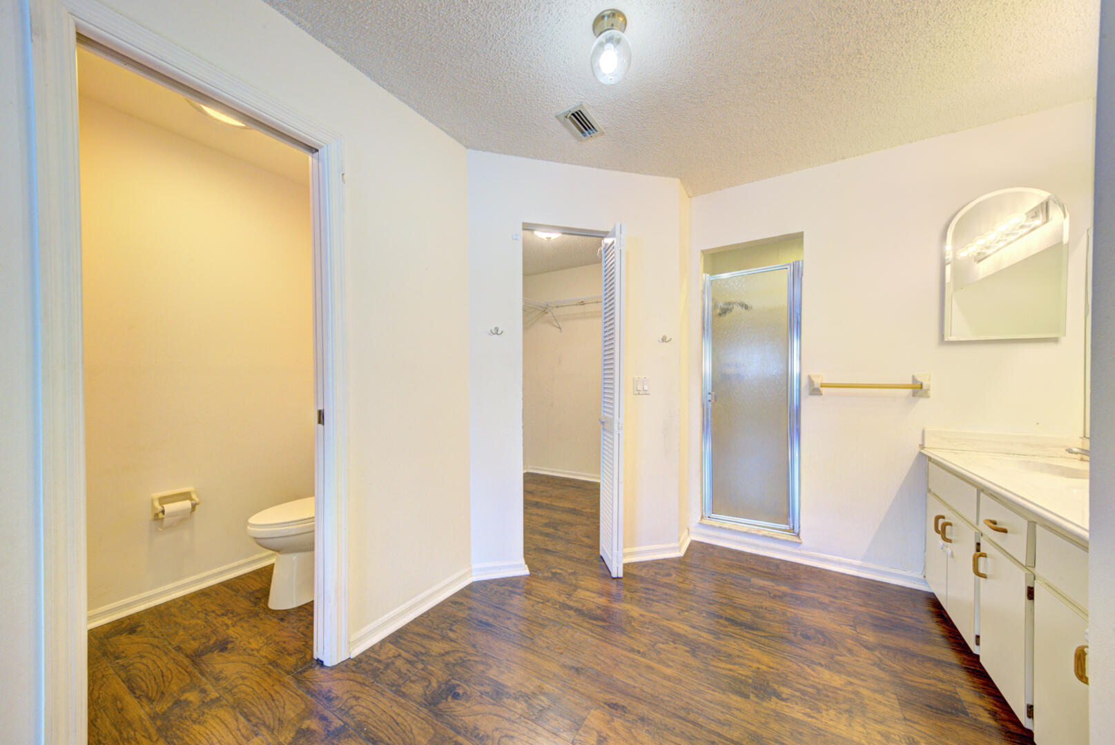 2423 Jaywood Road Titusville, FL 32780 - Photo 28 of 37 a bathroom with a sink and a toilet