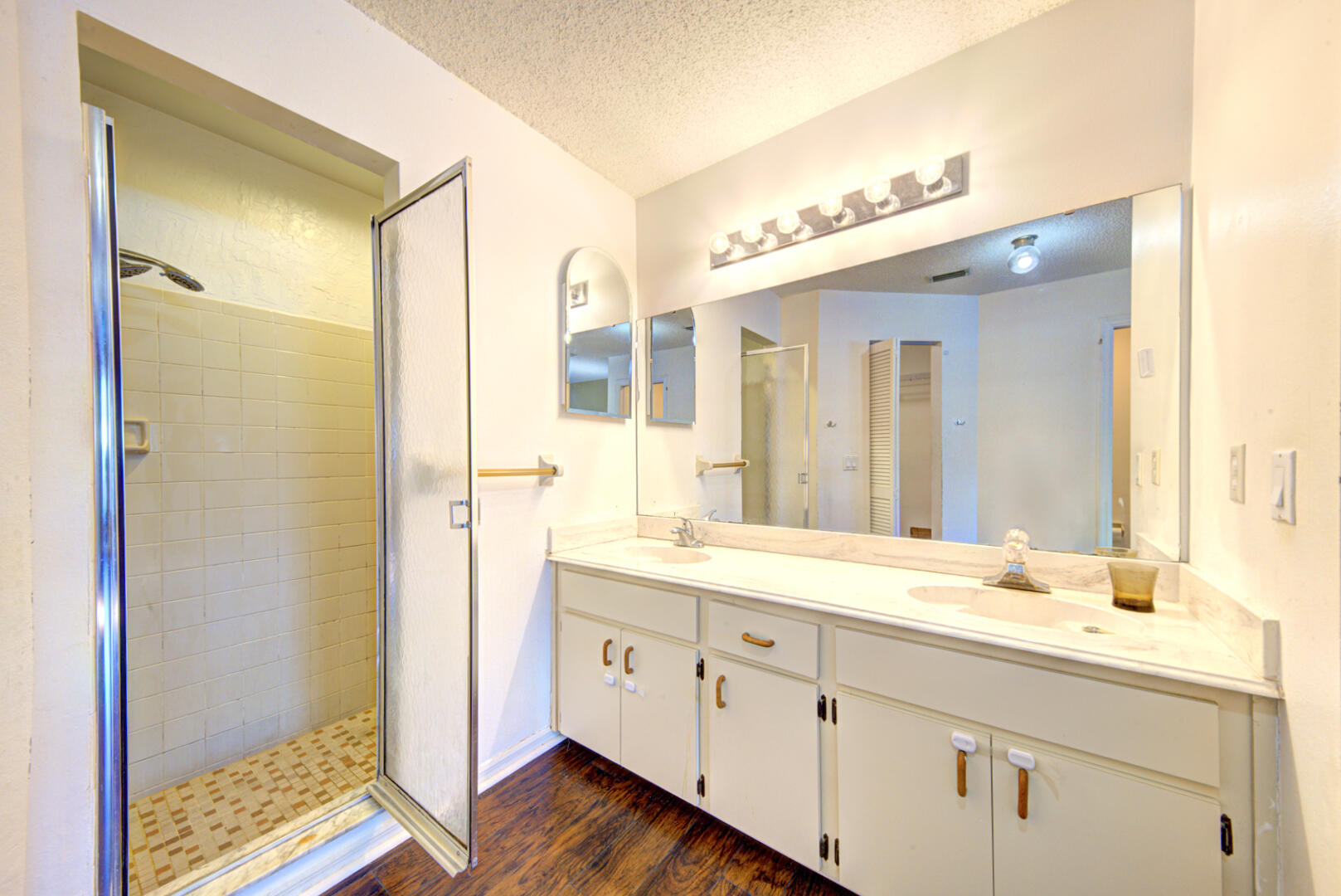 2423 Jaywood Road Titusville, FL 32780 - Photo 29 of 37 a spacious bathroom with a double vanity sink mirror and