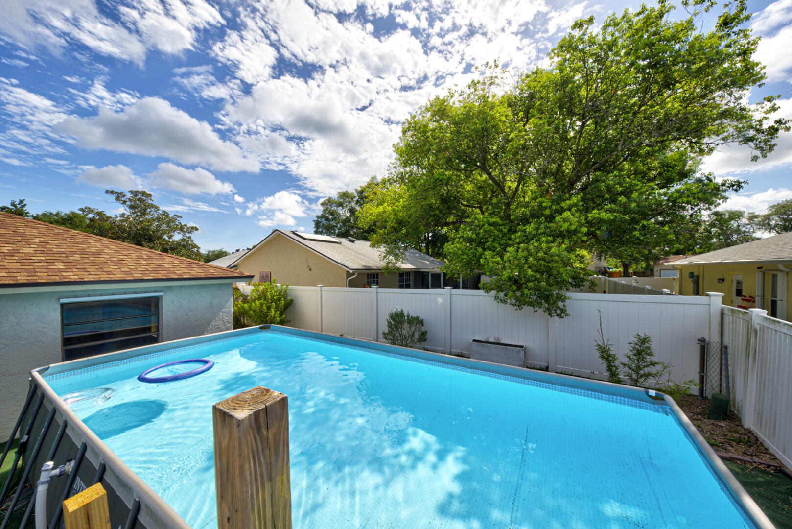 2423 Jaywood Road Titusville, FL 32780 - Photo 35 of 37 a view of a backyard with potted plants