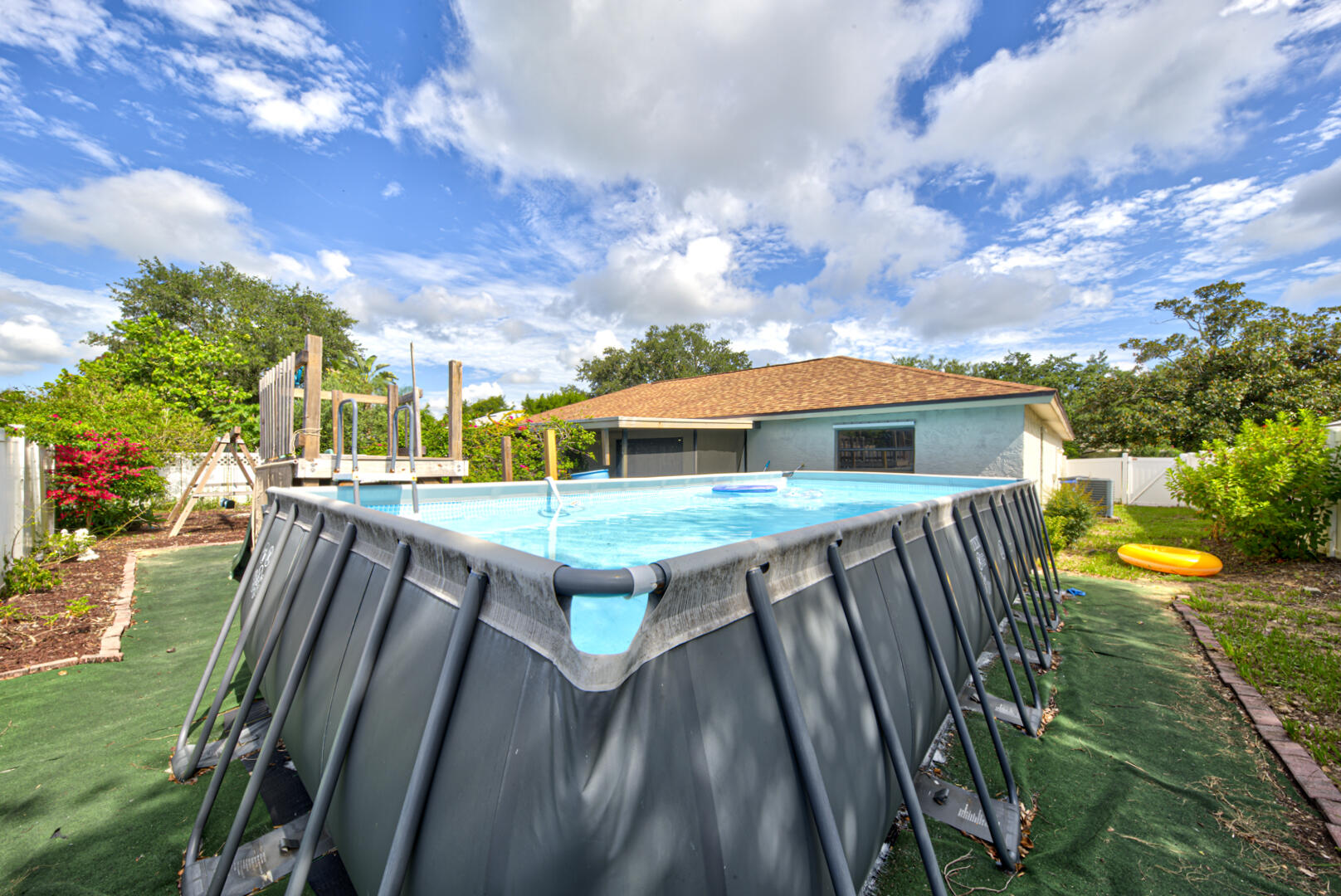 2423 Jaywood Road Titusville, FL 32780 - Photo 36 of 37 a view of an outdoor sitting area