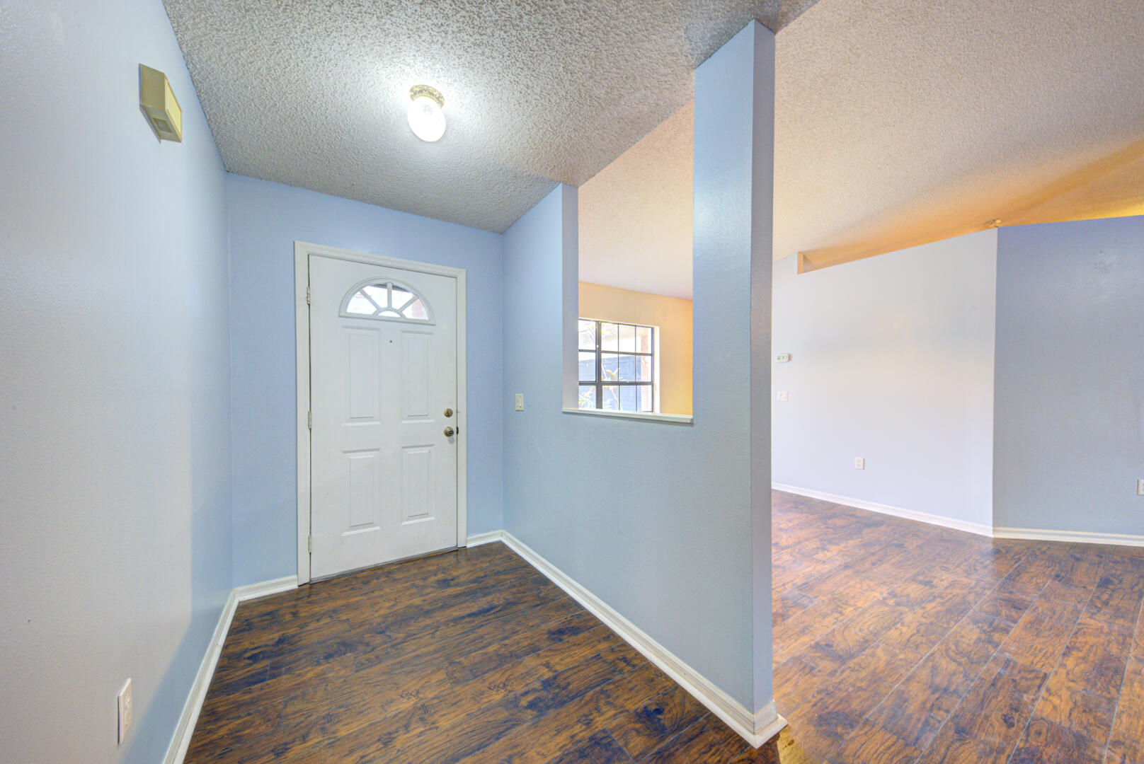 2423 Jaywood Road Titusville, FL 32780 - Photo 5 of 37 a view of hallway with wooden floor