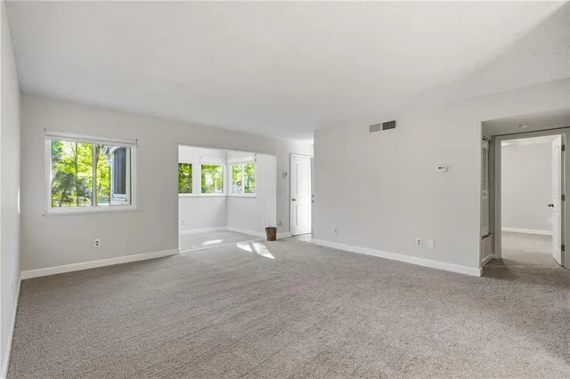 an empty room with windows