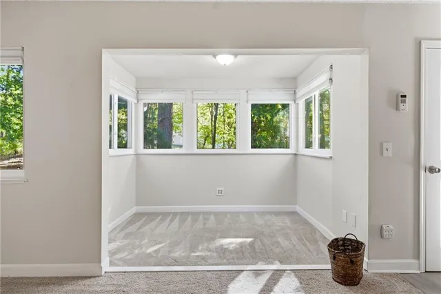 a view of a room that has a window