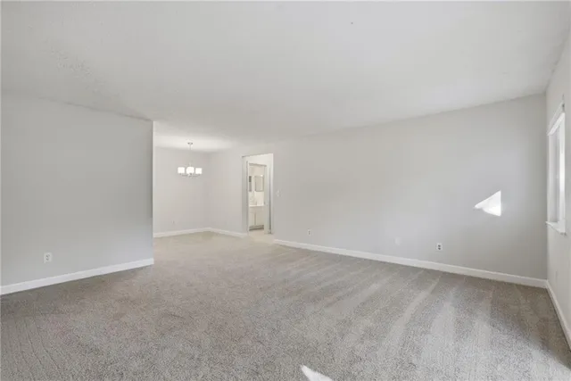 a view of an empty room and window