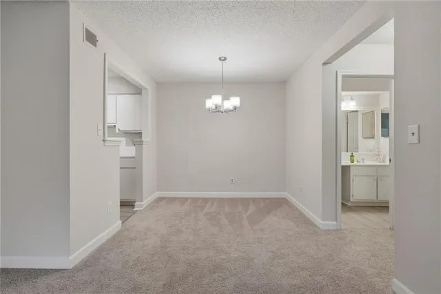 a view of a kitchen with a sink cabinets and window