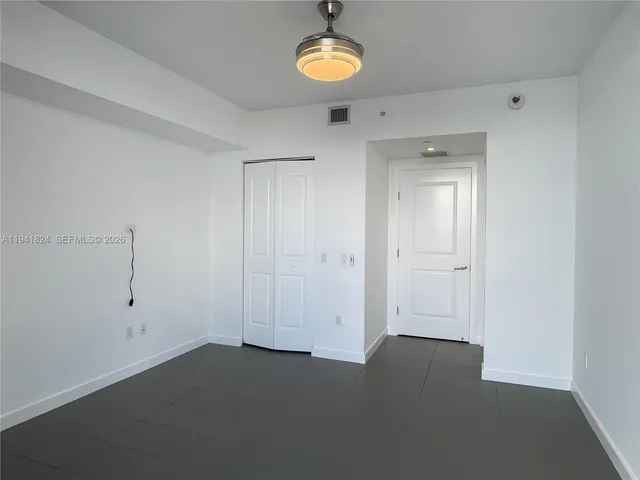 a view of a room with a fan