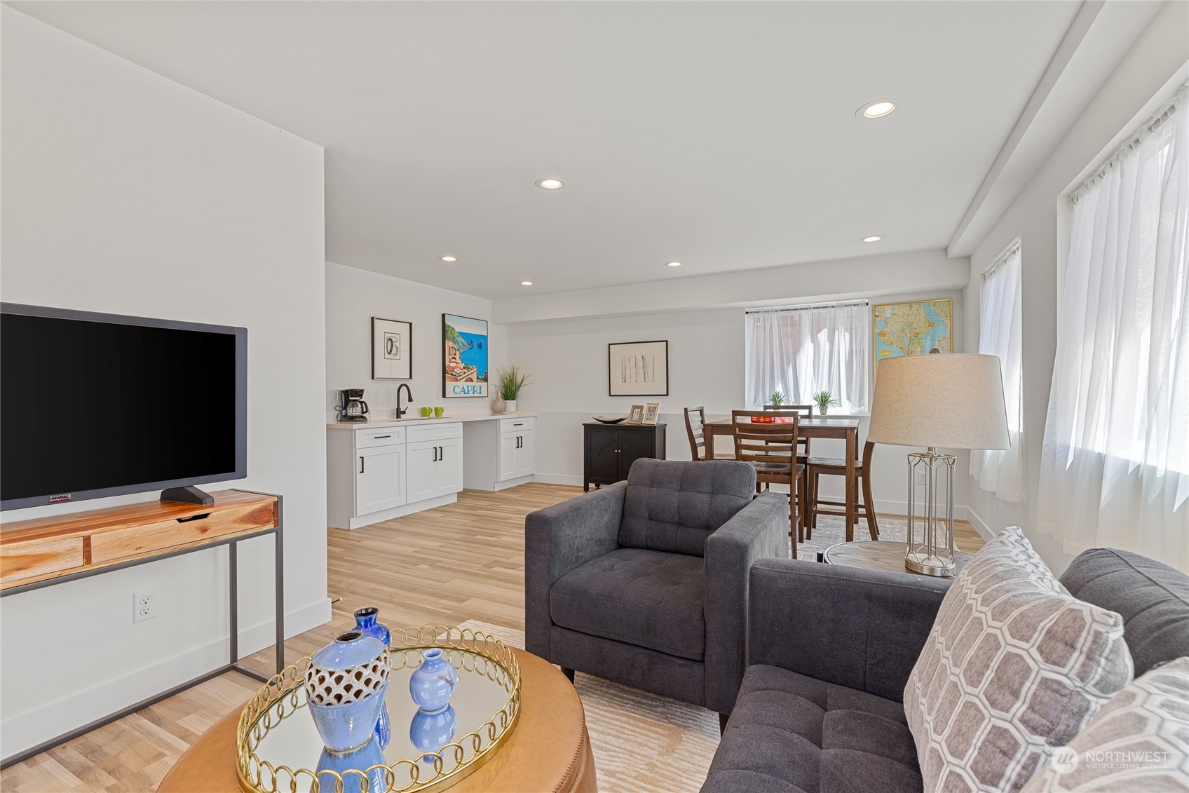 1042 South Director Street Seattle, WA 98108 - Photo 20 of 40 a living room with furniture and a flat screen tv