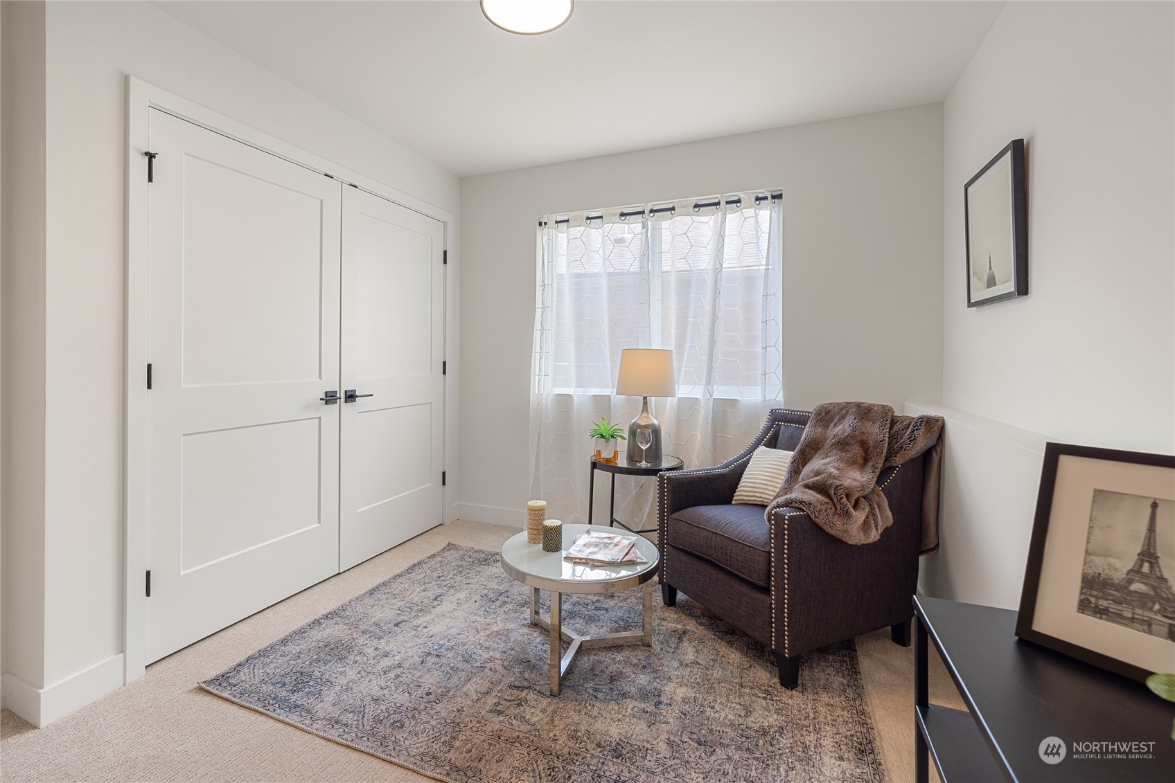 1042 South Director Street Seattle, WA 98108 - Photo 25 of 40 a living room with furniture and a rug