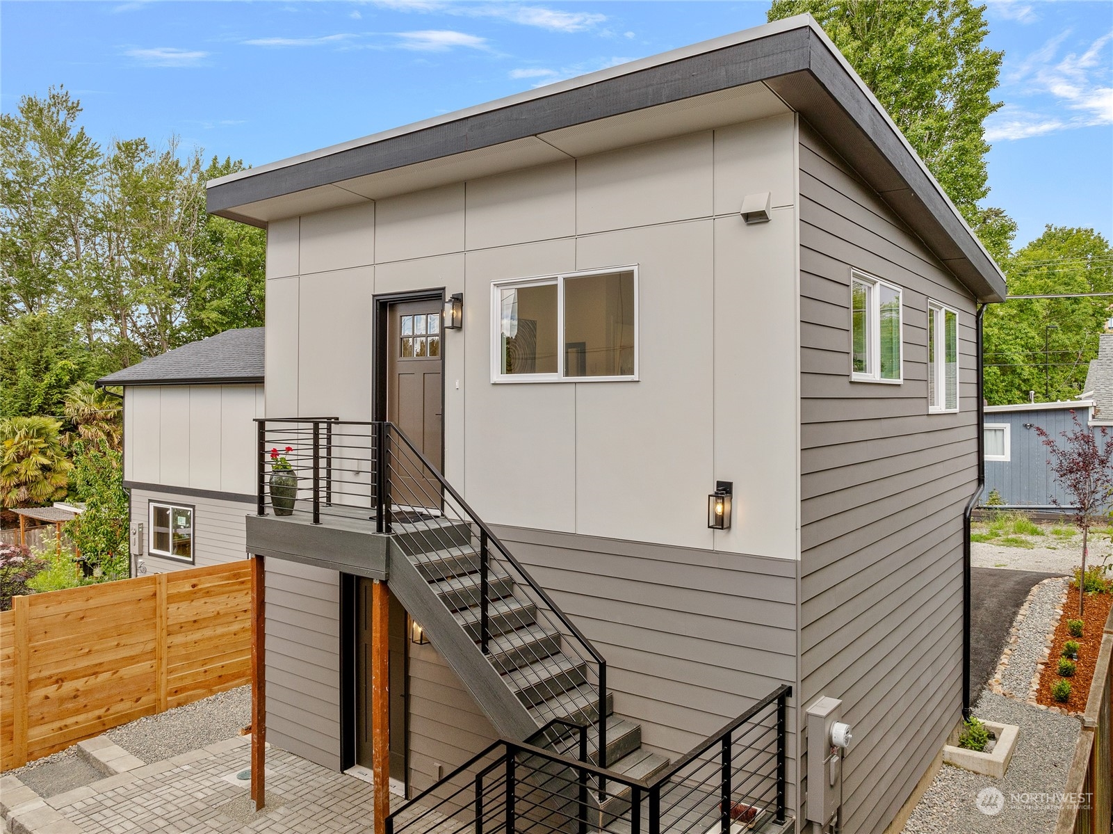 1042 South Director Street Seattle, WA 98108 - Photo 29 of 40 a view of a house with backyard and deck
