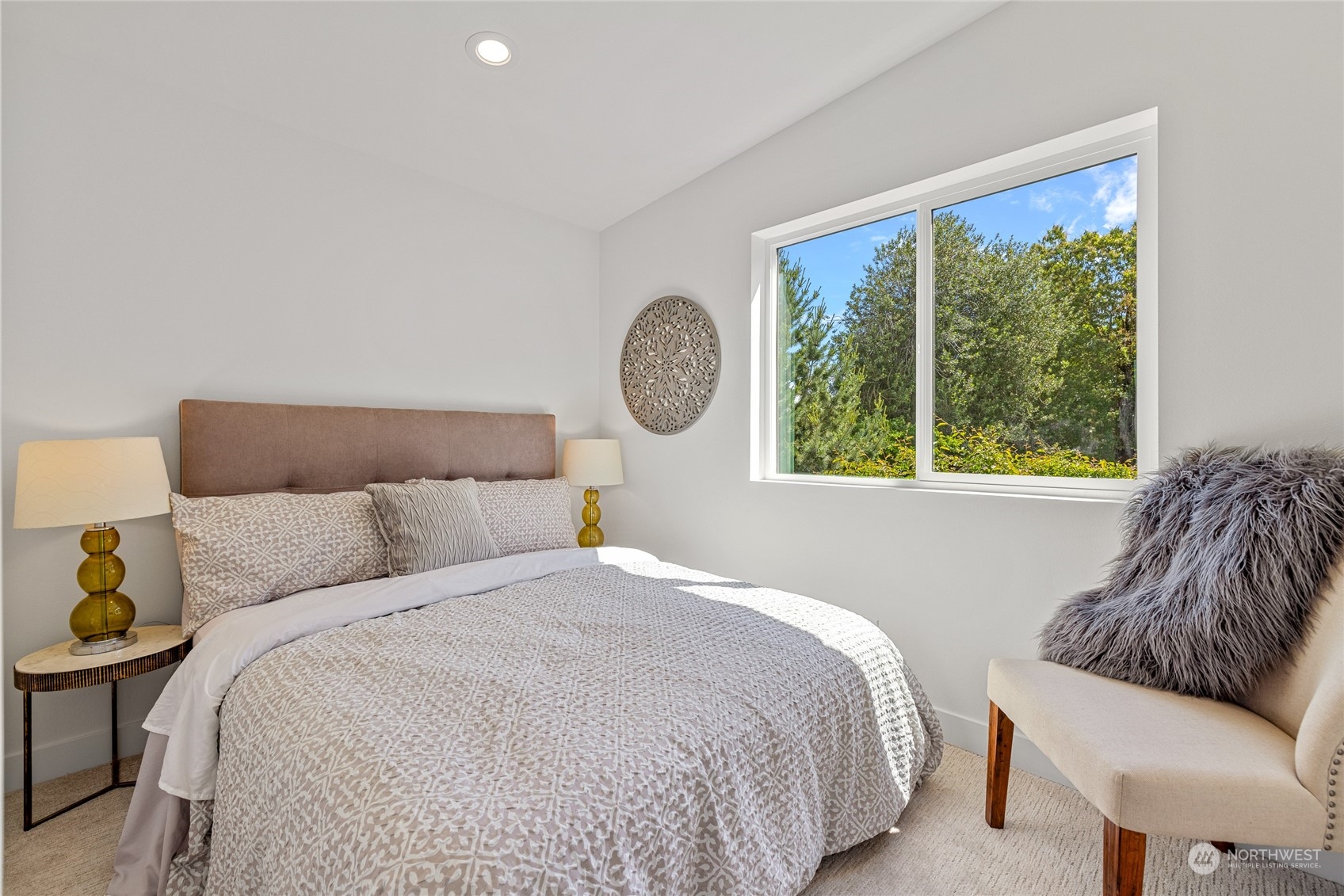 1042 South Director Street Seattle, WA 98108 - Photo 32 of 40 a bedroom with a bed and window