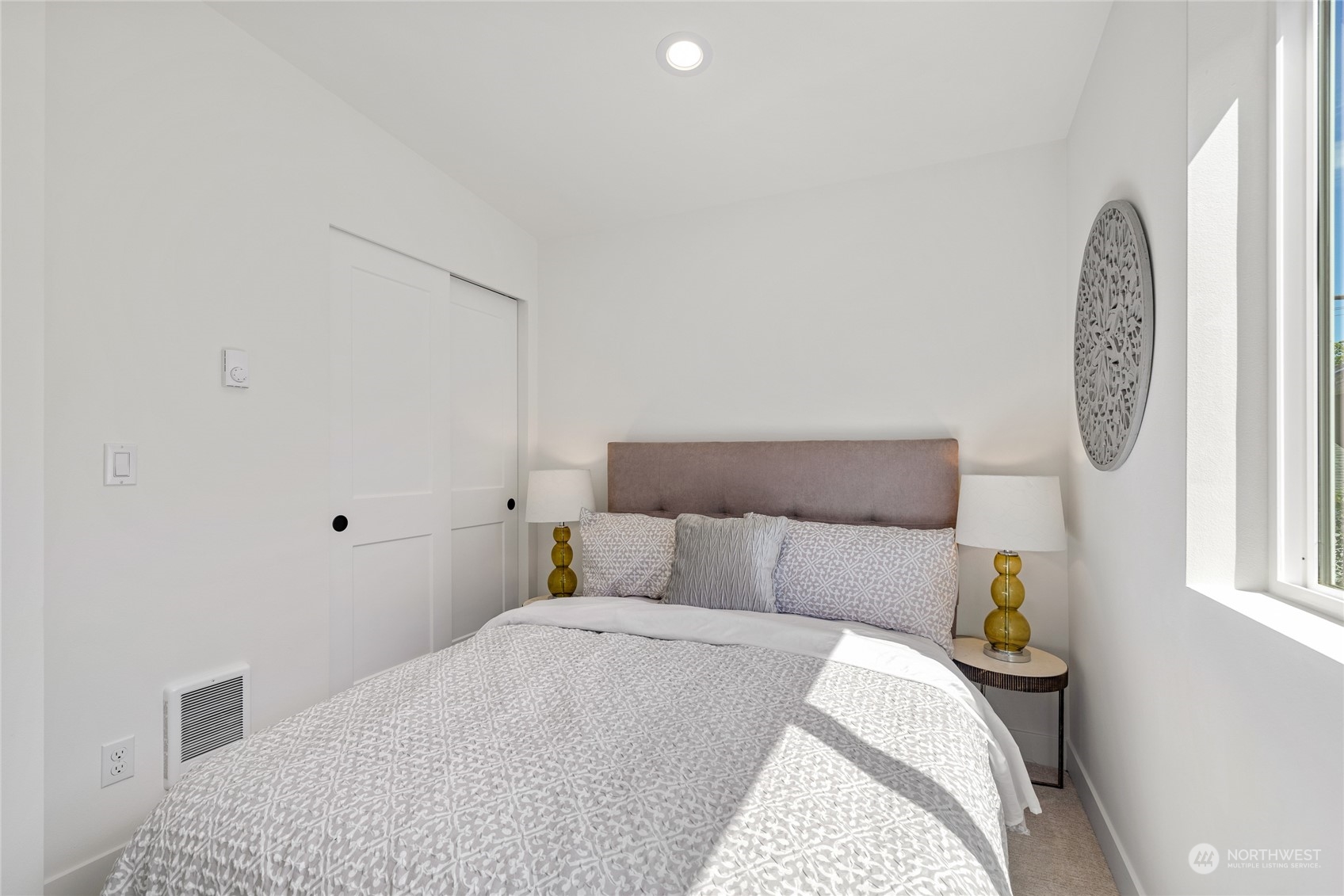 1042 South Director Street Seattle, WA 98108 - Photo 33 of 40 a bedroom with a bed and a window