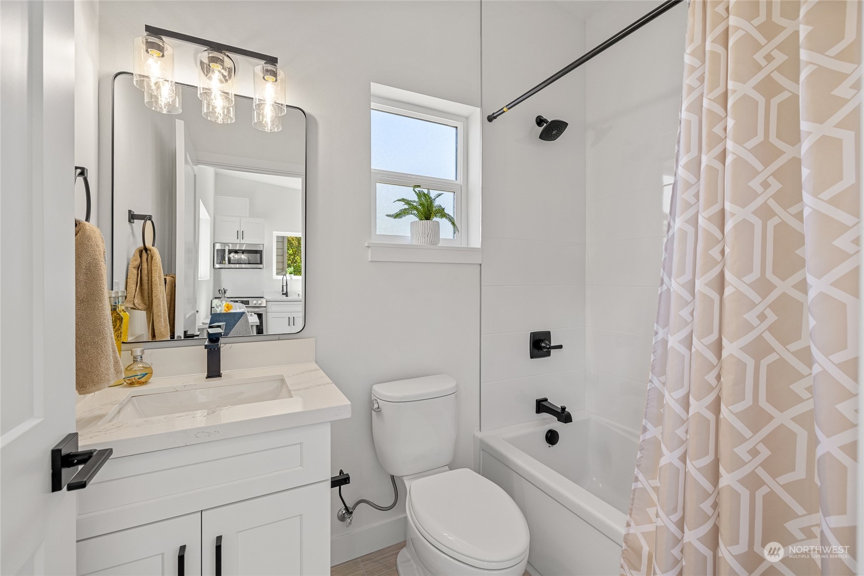 1042 South Director Street Seattle, WA 98108 - Photo 34 of 40 a bathroom with a sink a toilet and shower