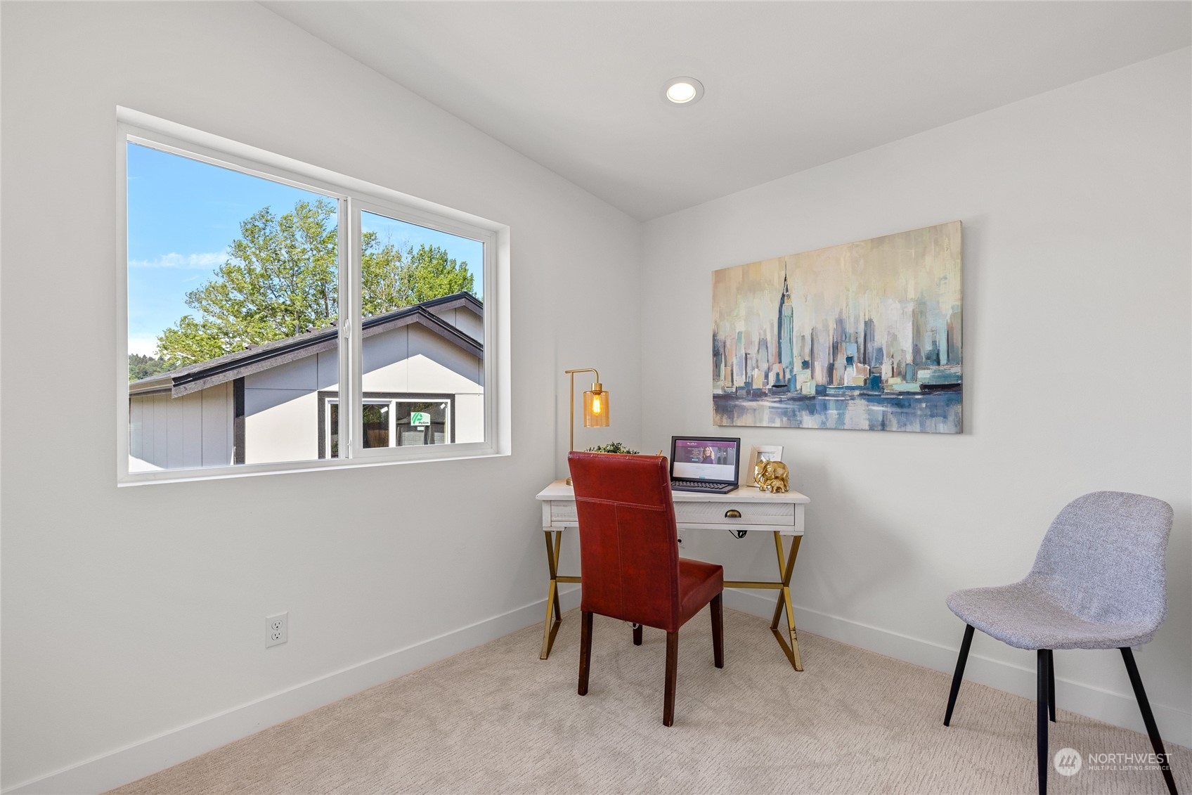 1042 South Director Street Seattle, WA 98108 - Photo 35 of 40 a view of a workspace with furniture and a window